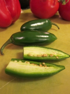 Jalapeños. Cut in two.